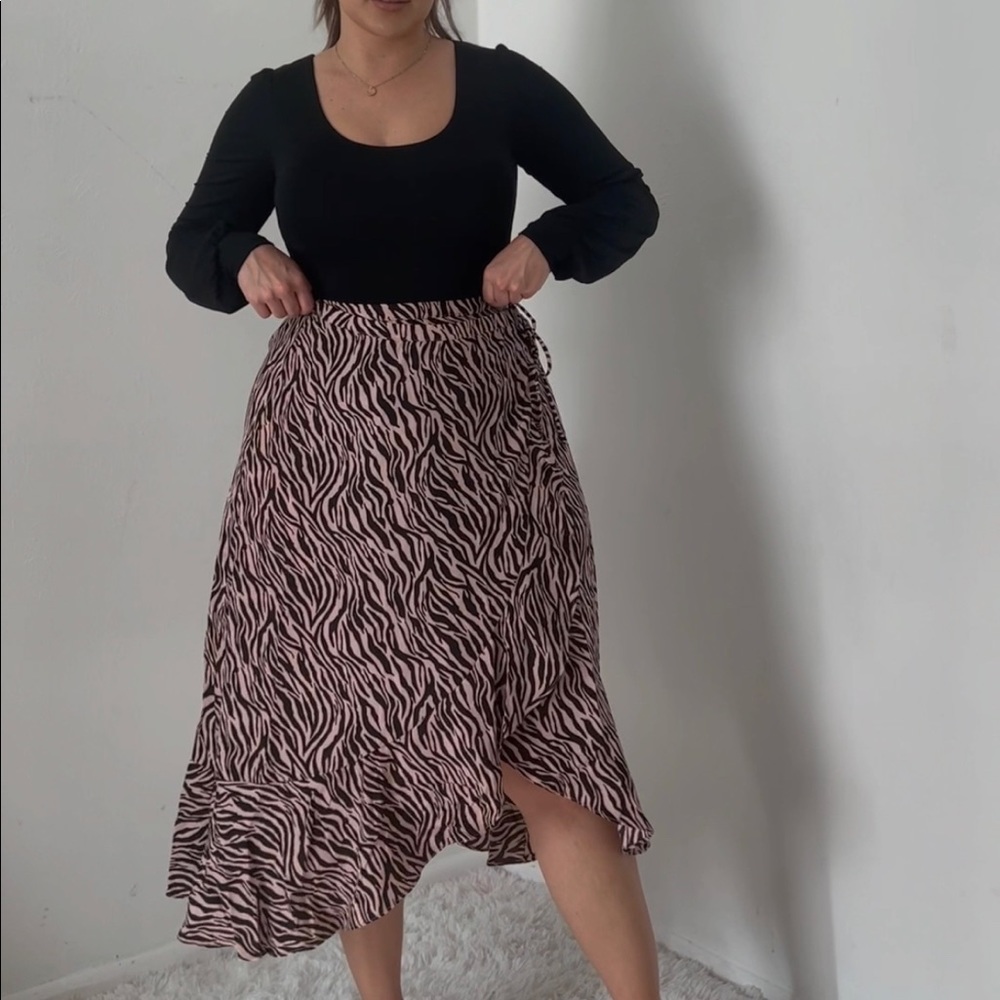 Zebra wrap skirt. Available in Small Medium And Large